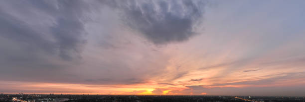 istock Panorama sky and cloud white and orange clouds, Beautiful sunset sky 1445622590