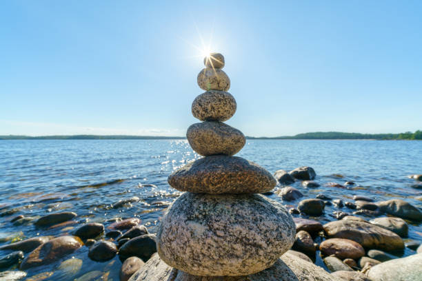 istock Pyramid of stones. Unstable balance of stone objects. 1445623131
