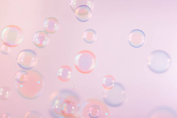 istock Abstract Beautiful Pink Soap Bubbles Background. Freshness Soap Sud Bubbles Water. 1445626762