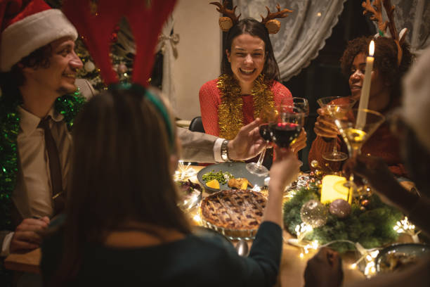 istock Friends celebrating Christmas at home 1445627913