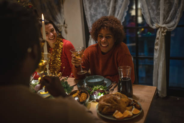 istock Christmas dinner at home with friends 1445629389
