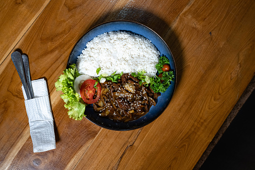 Brazilian beef barbecue with complements - Salad, vegetable mayonnaise, rice and fries