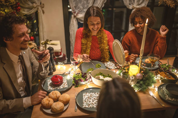 istock Christmas dinner at home with friends 1445630095