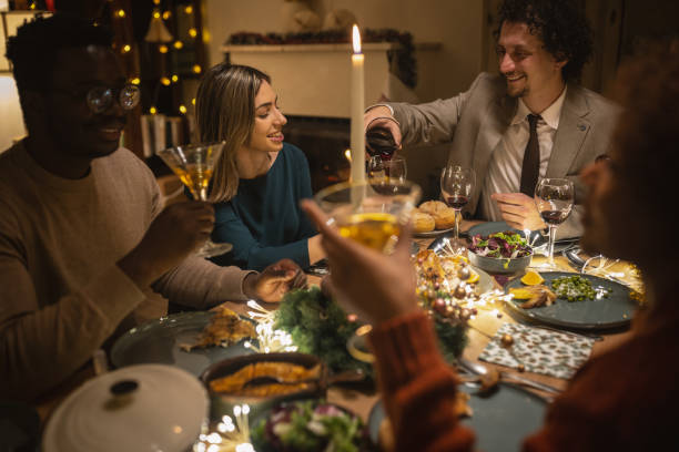 istock Friends celebrating Christmas together 1445630391