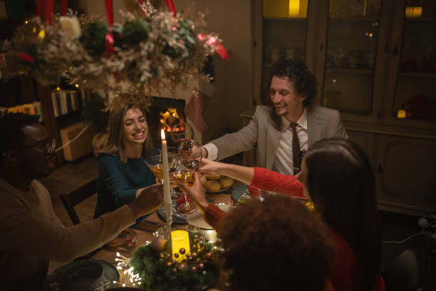 istock Friends toasting on Christmas dinner at home 1445631172