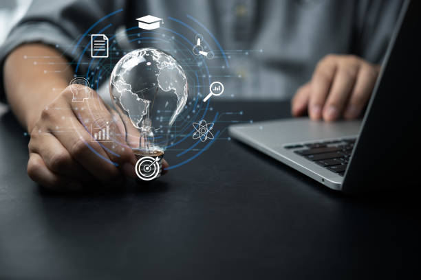 istock Businessperson or student training skill holding glowing lightbulb with Education learning icons for study knowledge to creative thinking idea and planning or working solution concept. 1445634681
