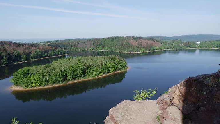 Lake and island with trees. Water reservoir Sec, Czech Republic, Europe