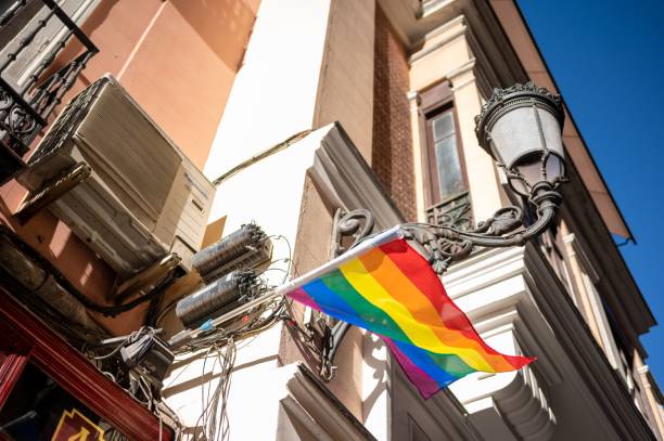 istock Low angle shot of a pride flag on a building facade 1445642223