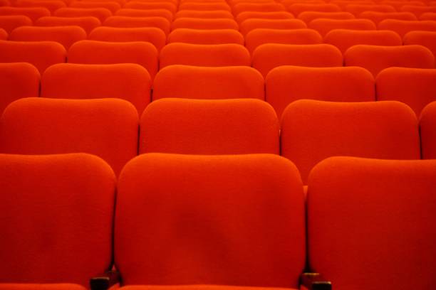 istock Empty theater seats in perfect rows indoor 1445642884