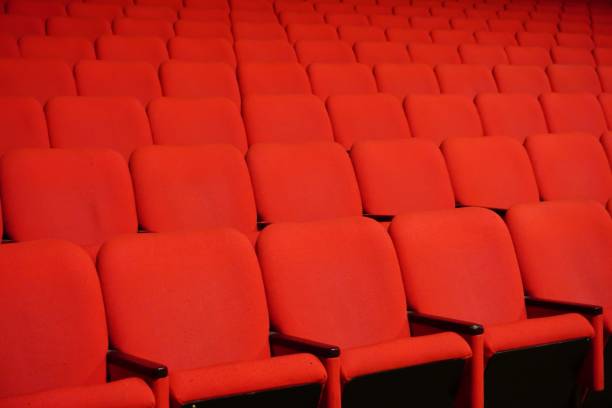 istock Empty theater seats in perfect rows indoor 1445642888