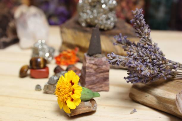 istock Incense Cone on Stone With Crystals and Flowers. Meditation Table 1445646866