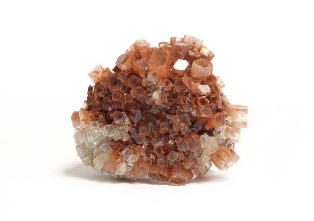 chakra stone espécimen de cristal de carbonato de aragonito aislado sobre fondo blanco - aragonita fotografías e imágenes de stock