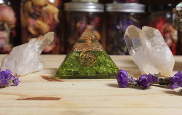 istock Quartz Crystals and Stone Pyramid With Flower. Relaxation and Meditation Decor 1445647038