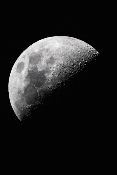 istock Mesmerizing view of a half-moon against a dark background 1445647778