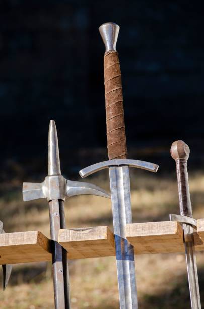 istock Replicas of medieval swords for historical reenactments 1445648182