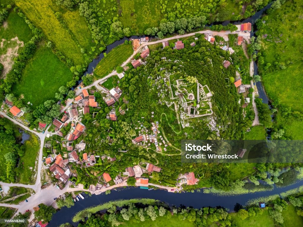 Top view of modern buildings surrounded by trees in Podgorica, Montenegro A top view of modern buildings surrounded by trees in Podgorica, Montenegro Podgorica Stock Photo