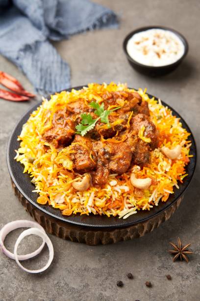 istock Delicious chicken biryani with ingredients 1445648886