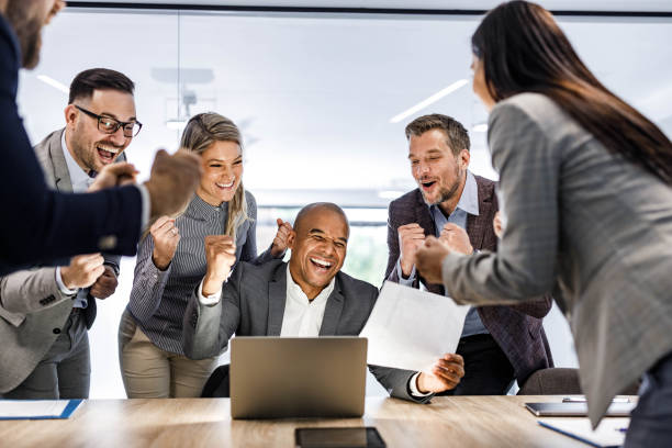 istock Celebrating good news in the office! 1445649157