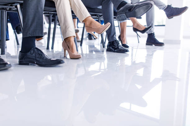 istock Unrecognizable entrepreneurs attending a seminar in board room. 1445651469