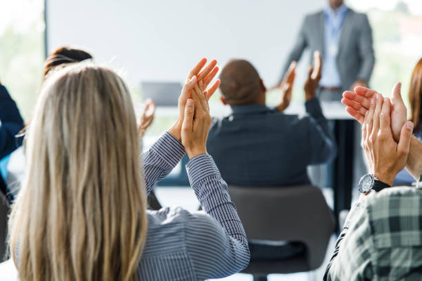 istock Applauding on successful business presentation! 1445651567