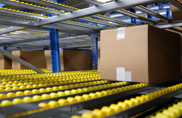istock Closeup of a box in a Warehouse with yellow rollers 1445652479