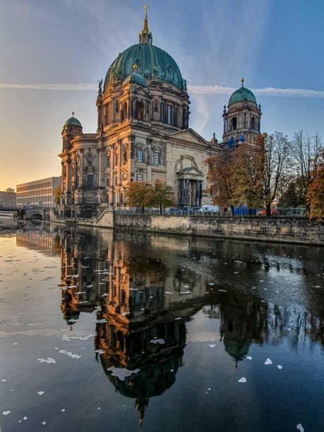 istock Spectacular shot of Berlin Cathedral reflecting in a river at dramatic sunset 1445652683