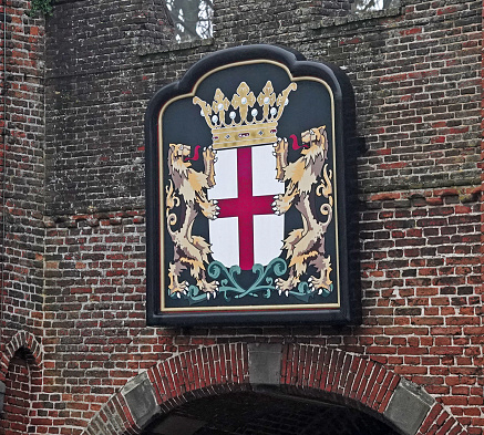 Coat of arms of the Dutch municipality of Amersfoort, Netherlands. It is part of the old city gate from 1425 called Koppelpoort
