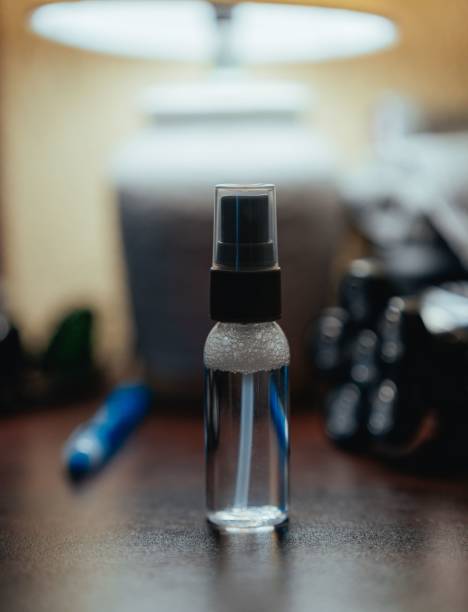 istock Closeup of a small plastic bottle on a table with blurred background 1445656675
