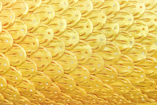 istock Naga scale texture seamless patterns abstract on gold yellow background 1445657693