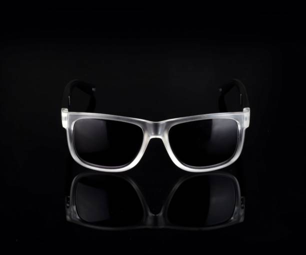 istock Closeup of sunglasses with white frames reflected on a black surface 1445658460