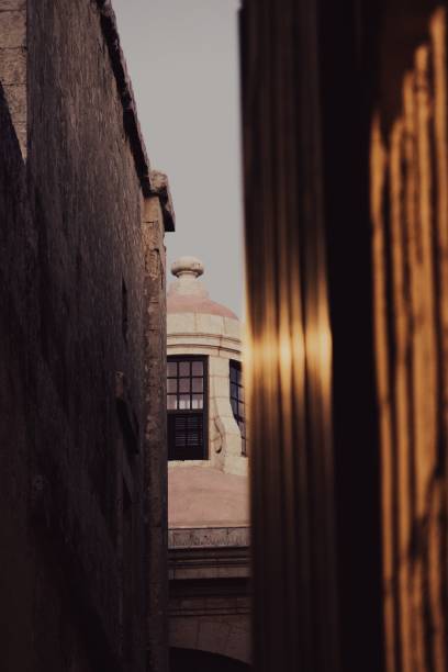 istock Old building seen from a narrow space between buildings in Mdina, Malta 1445659975