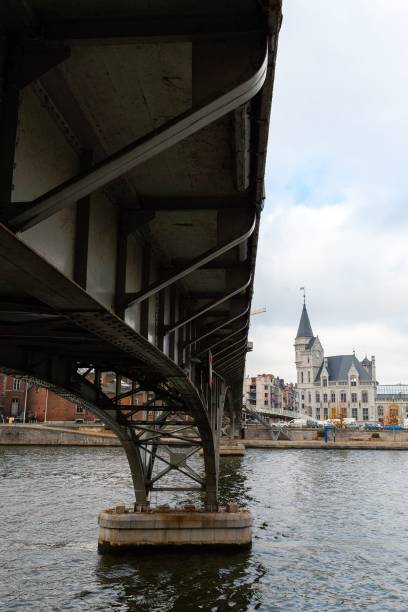 istock Vertical shot of under a bridge over a river in Luik, Belgium 1445661079