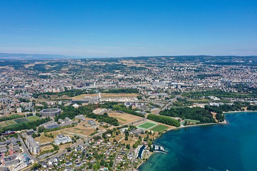 The beautiful lake geneva with the suburbs of Lausanne and the EFPL. The image, made as high angle picture was captured during summer season.