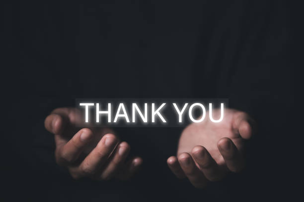 istock Two hands show thank you message 1445665661