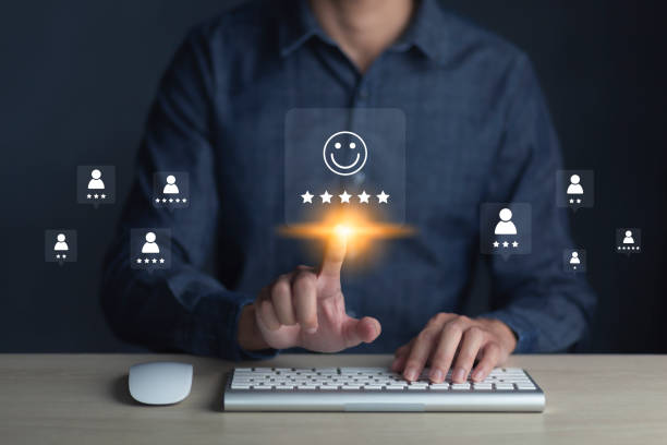 istock Consumers are evaluating their satisfaction with the service. Consumers write reviews about their satisfaction with a product or service. Consumers use the smiley face icon symbol and 5 stars. 1445666172