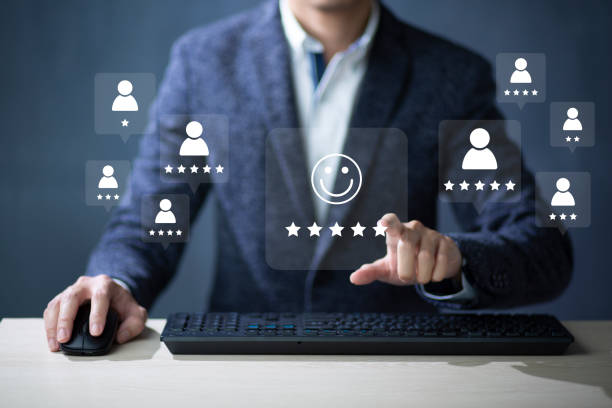 istock Consumers are evaluating their satisfaction with the service. Consumers write reviews about their satisfaction with a product or service. Consumers use the smiley face icon symbol and 5 stars. 1445666192
