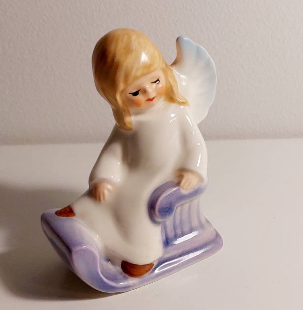 istock Porcelain angel on a sleigh 1445669709