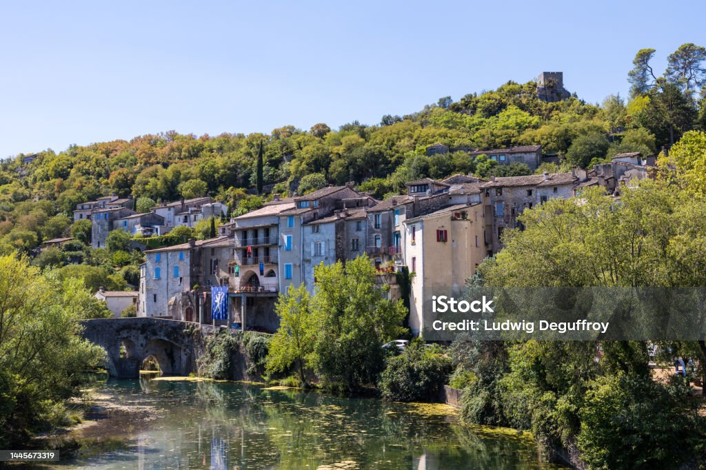 Summer view of the houses along the Vidourle in Sauve Cevennes Stock Photo