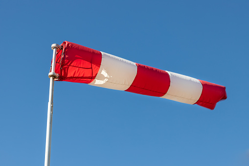 A windsock is a conical textile tube that resembles a giant sock
