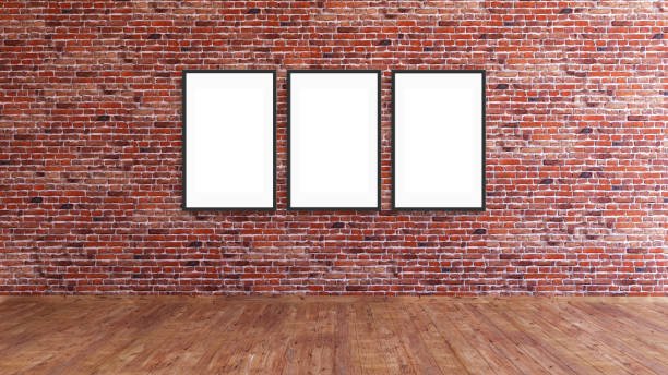istock 3 vertical frame mockup on a red brick gallery wall with wooden floor 3d rendering. 1445677025