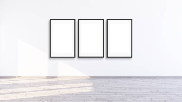 istock Three vertical modern black frame mock up in a white room, 3d illustration of a white wall render. 1445677082