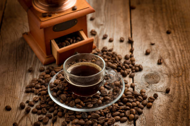 istock cup of coffee with coffee grinder 1445677352