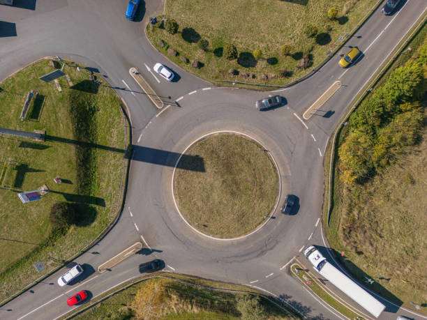 istock Drone point of view, round about busy traffic 1445679875