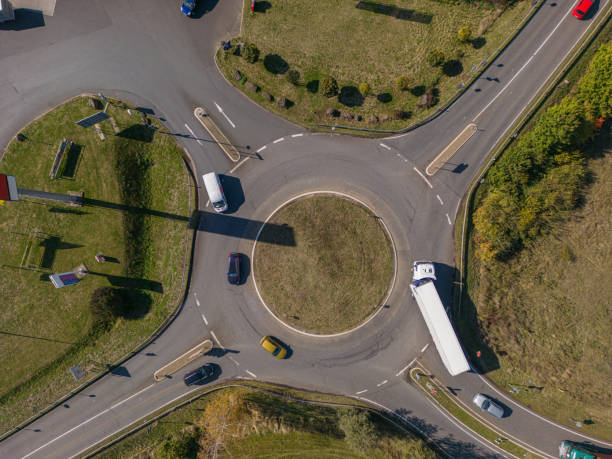 istock Drone point of view, round about busy traffic 1445679876