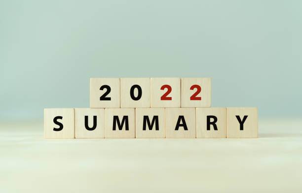 istock 2022 year summary text on wooden cube blocks on smart grey background. Past performance analysis for learning and  improvement. Preparation for annual plan for the next year. End of year concept. 1445683446