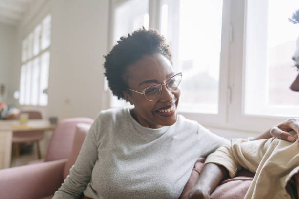 istock Friends talking on the couch 1445687798
