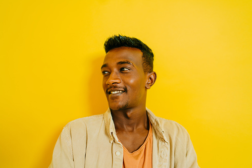 Portrait of a young, smiling African American man