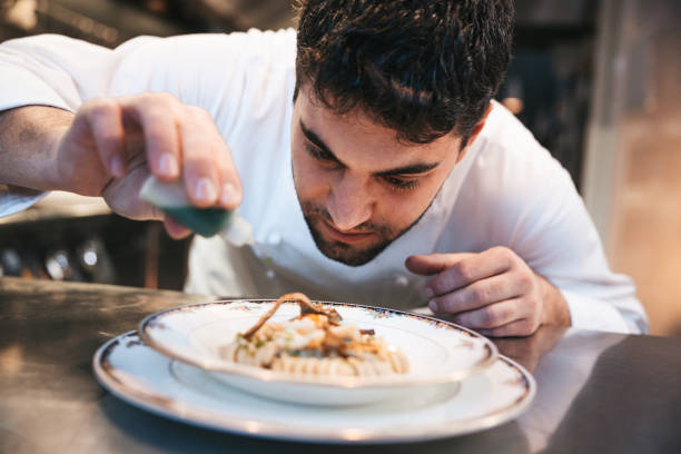 istock Chef preparing Fusilli pasta plate in a luxury restaurant 1445690591