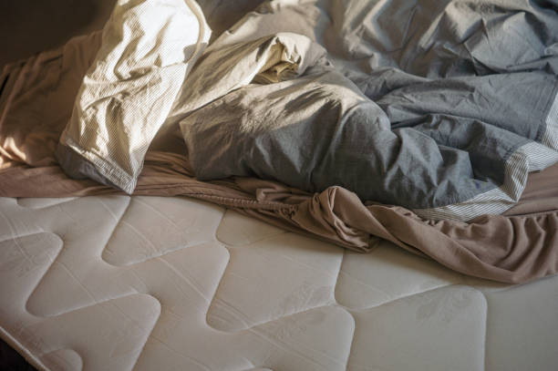 dirty bedding replacement stock photo