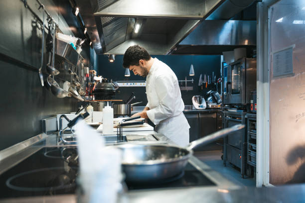 istock Chef cooking in a luxury restaurant 1445692397